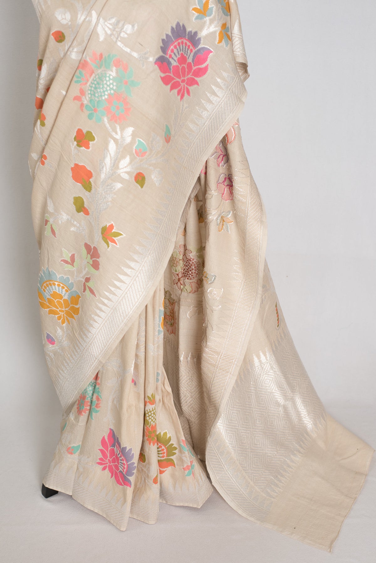 Nidhi : Beige & Silver Tussar Georgette Banarasi Saree with Minakari Florals