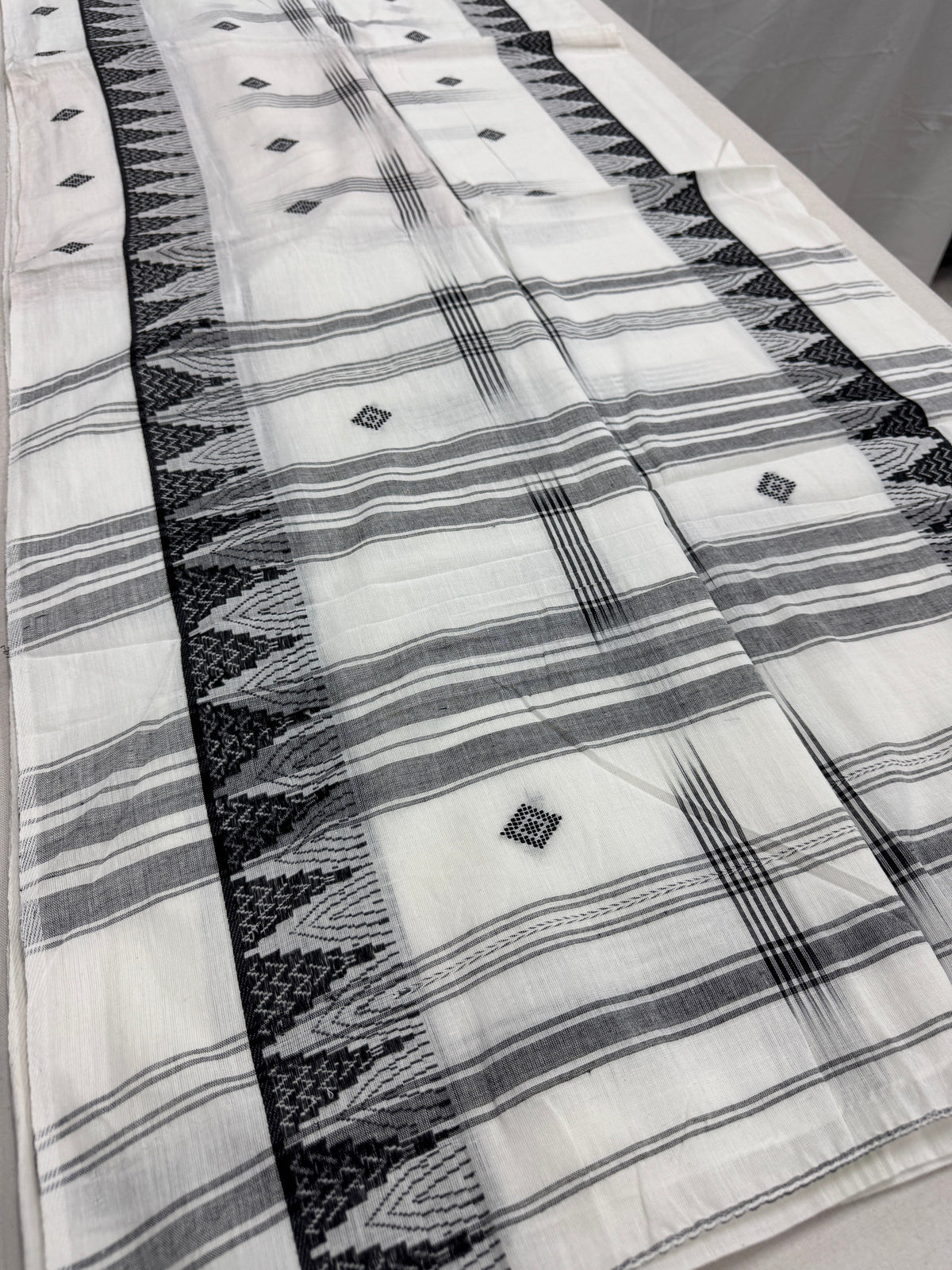 Maya : Off White and Black Soft Cotton Dhaniakhali Saree with Temple Border