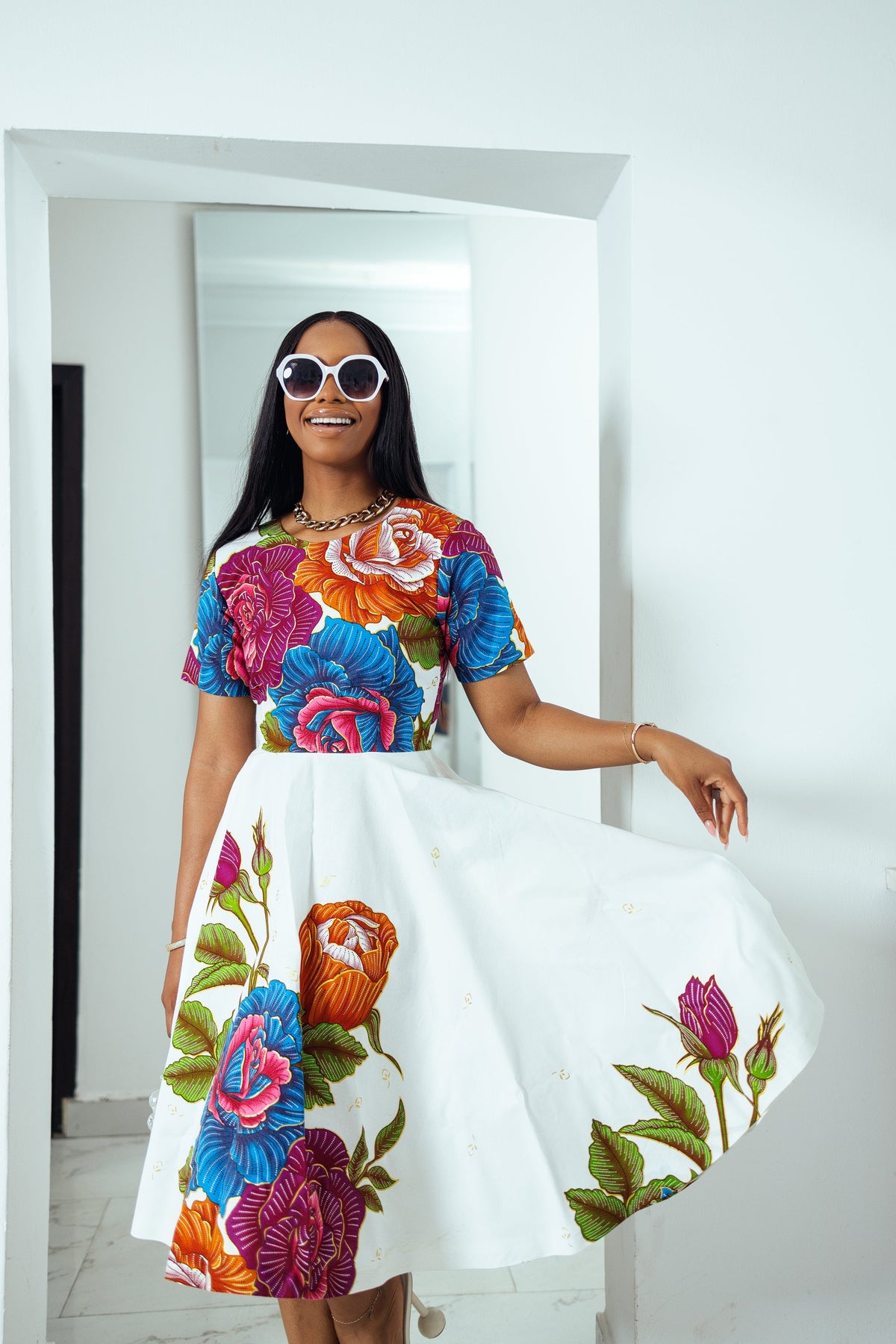 LOLADE AFRICAN PRINT FLORAL DRESS.