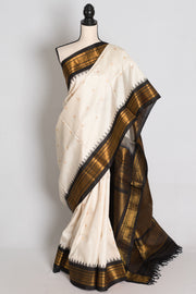 Sabina : Off White and Black Handwoven Gadwal Silk Saree with Gold Zari