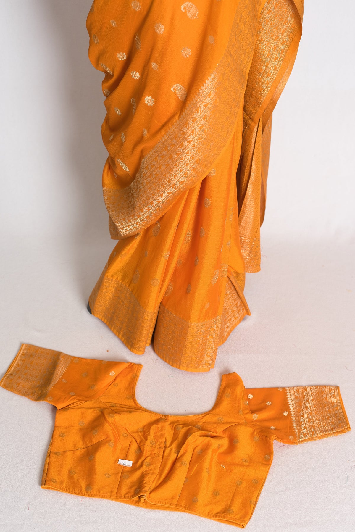 Harini: Turmeric Yellow Semi Georgette Banarasi Saree with 40 Size Blouse