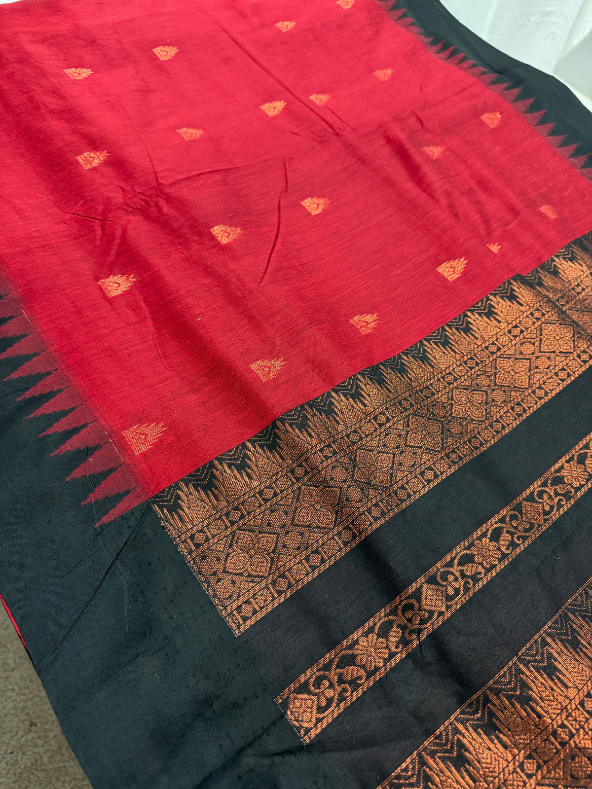 Dhriti: Dark Red Blended Cotton Gadwal Saree with Black Zari Border