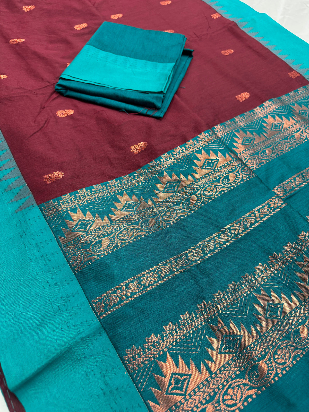 Pritha: Dark Brown and Sea Green Blended Cotton Gadwal Saree.