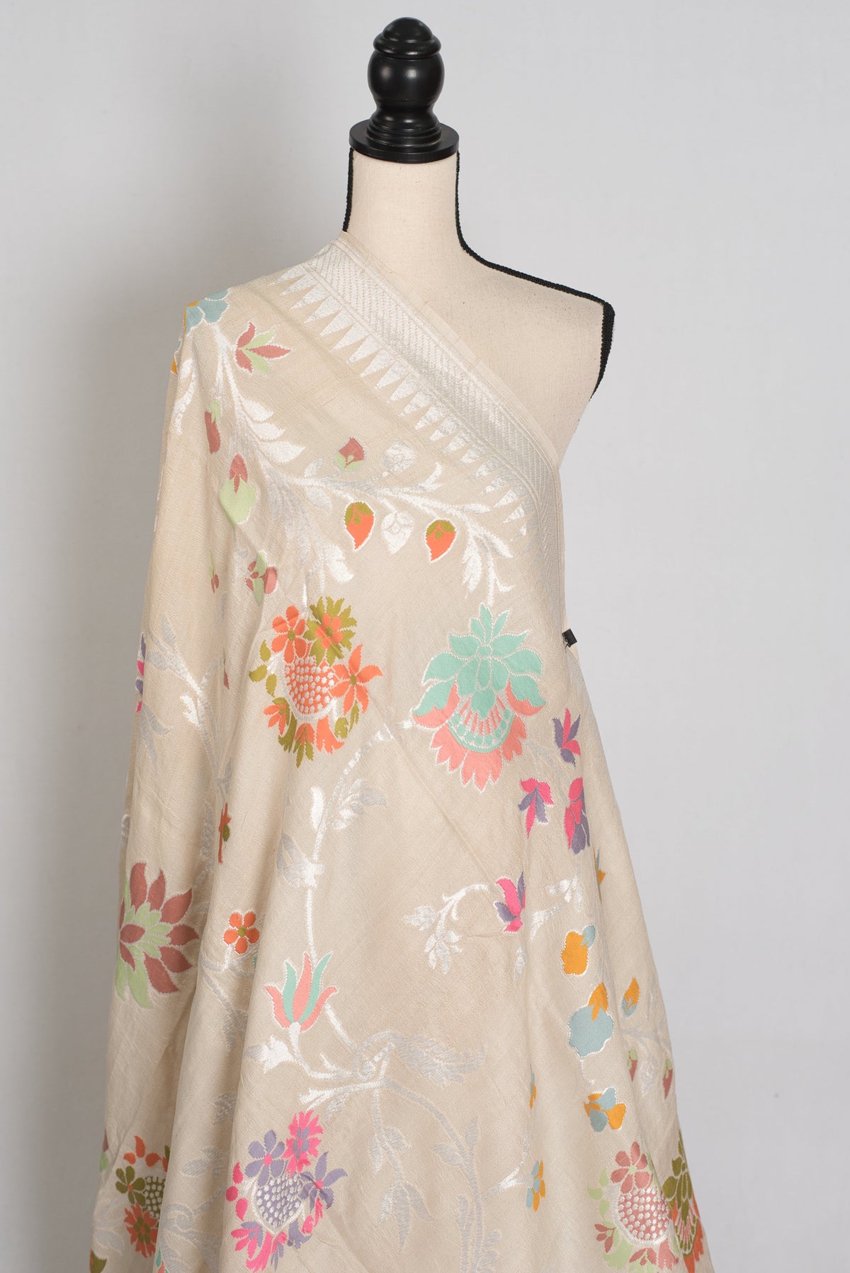 Nidhi : Beige & Silver Tussar Georgette Banarasi Saree with Minakari Florals
