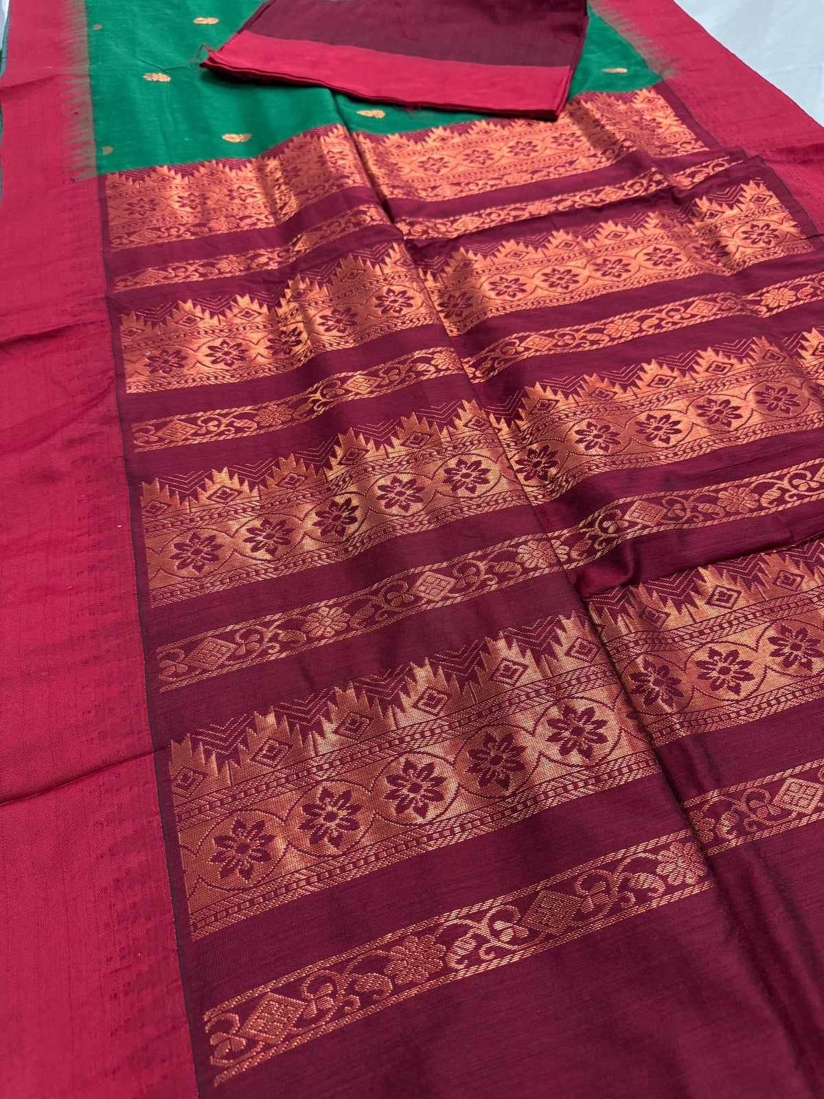 Gayetri: Dark Green Blended Cotton Gadwal Saree with Antique Zari Butis