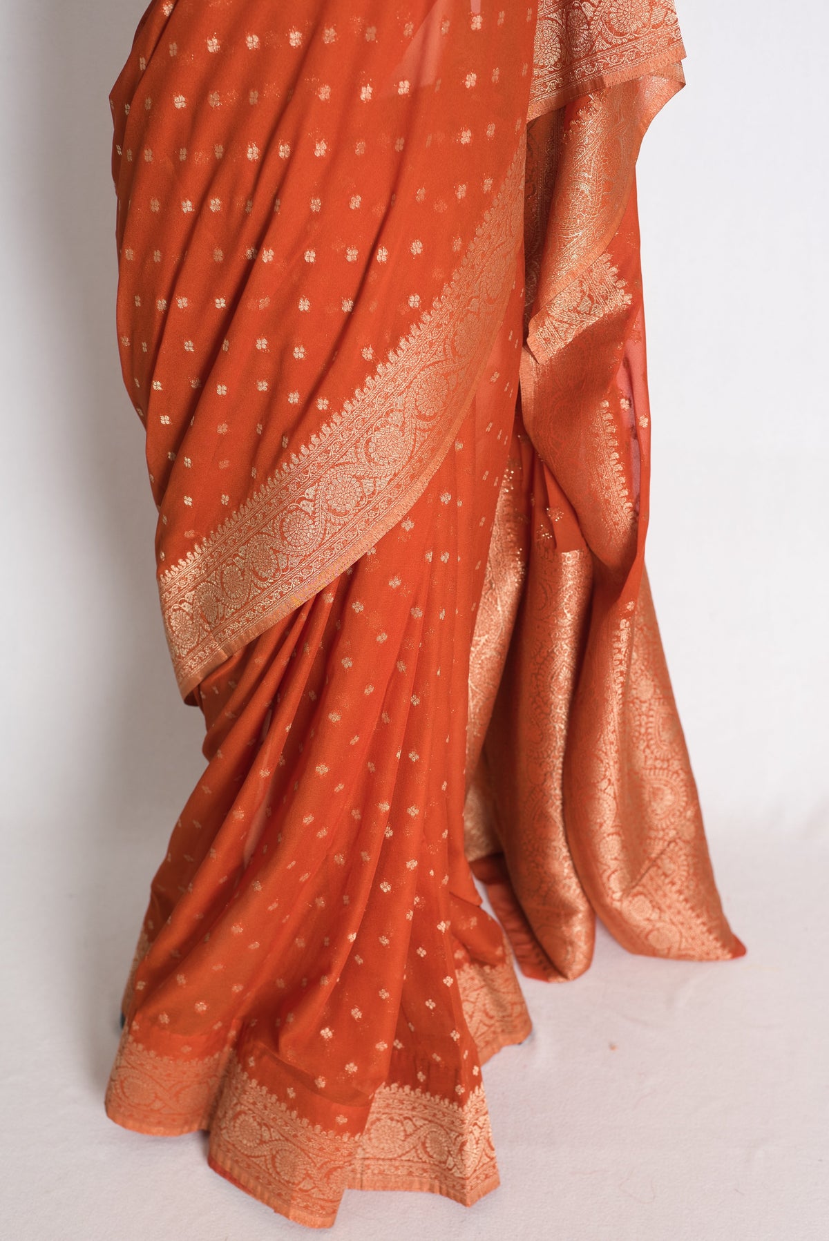 Mahi: Rust Brown Lightweight Semi Georgette Banarasi Saree with 38 Size Blouse