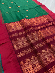 Gayetri: Dark Green Blended Cotton Gadwal Saree with Antique Zari Butis