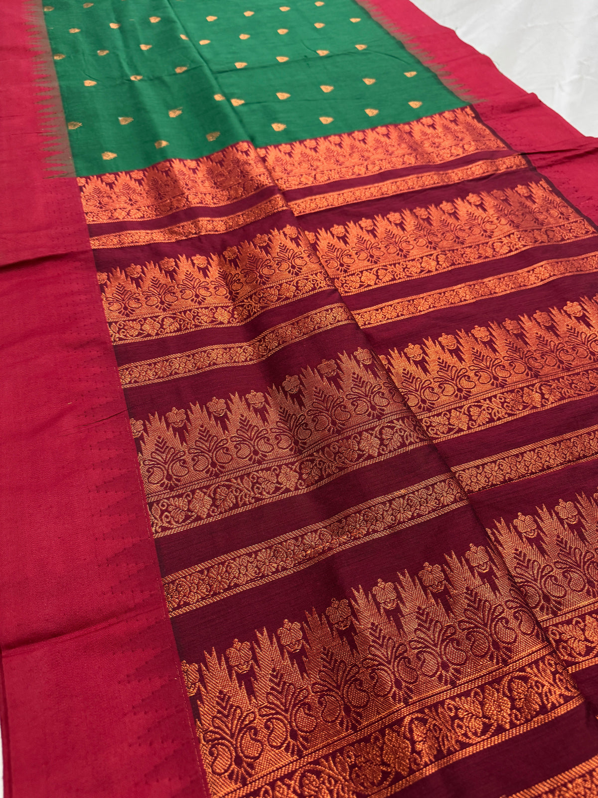 Mouni: Dark Green and Maroon Blended Cotton Gadwal Saree