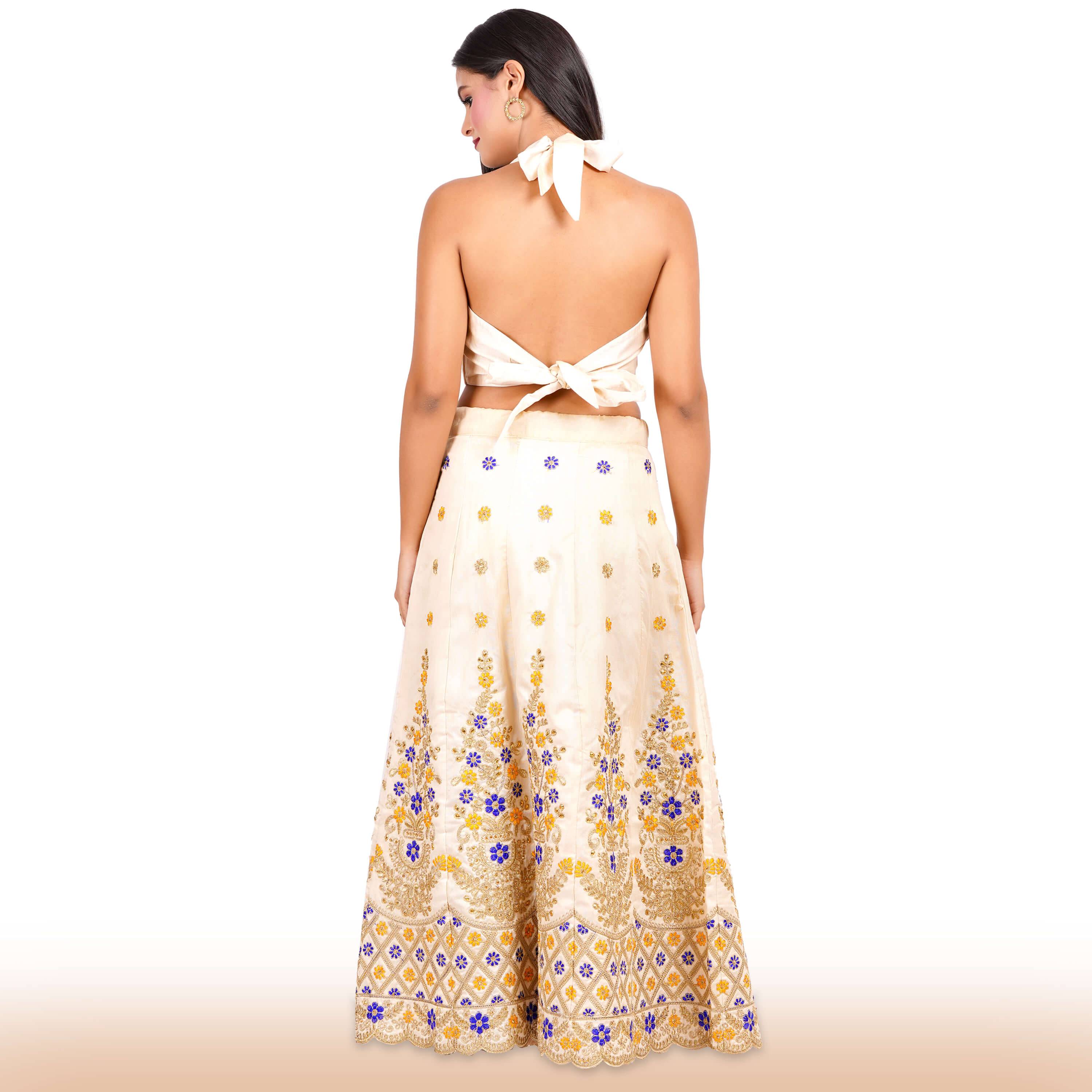 Beige Embroidered lehenga with intricate details
