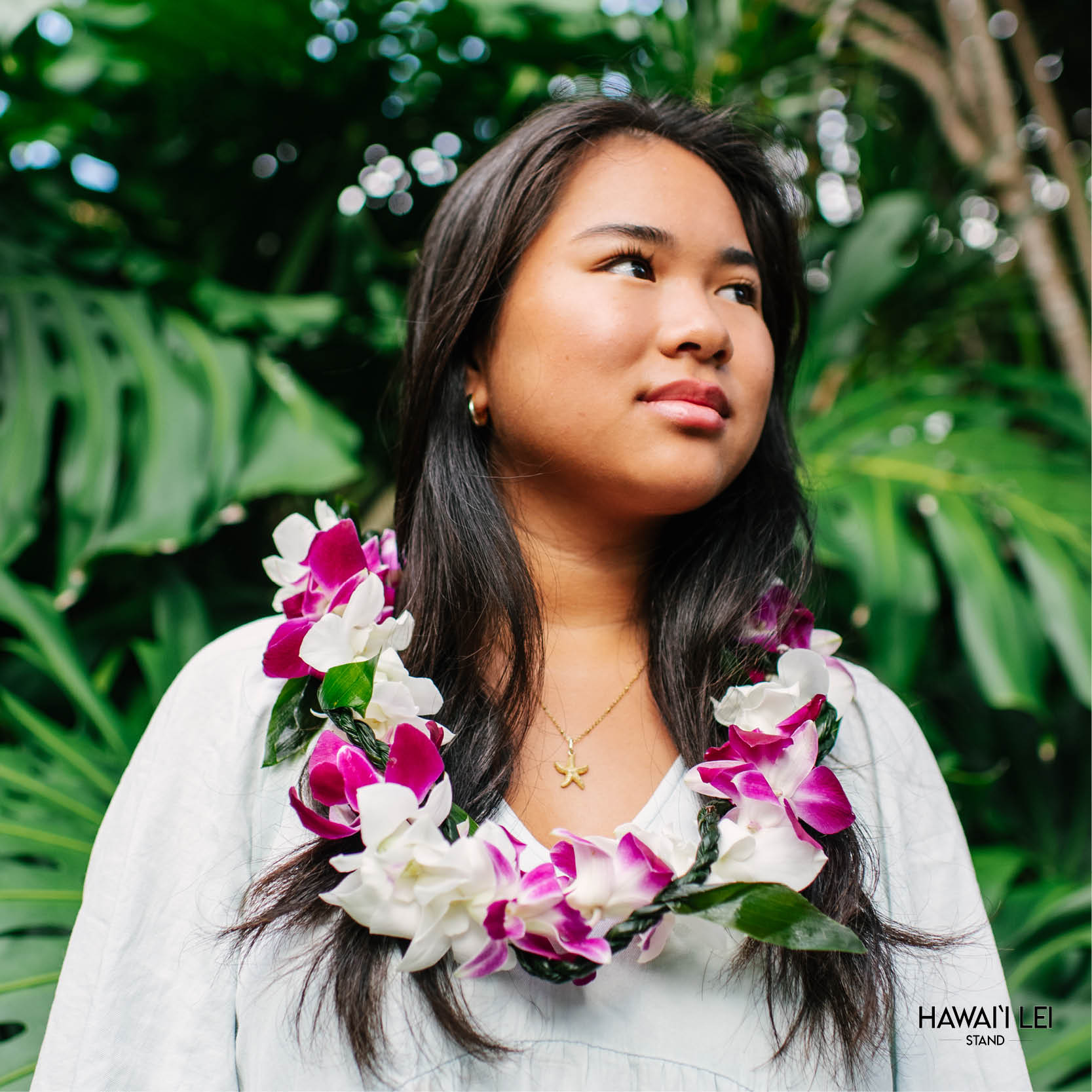 Orchid Wrapped With Ti Leaf Lei (Purple And White)