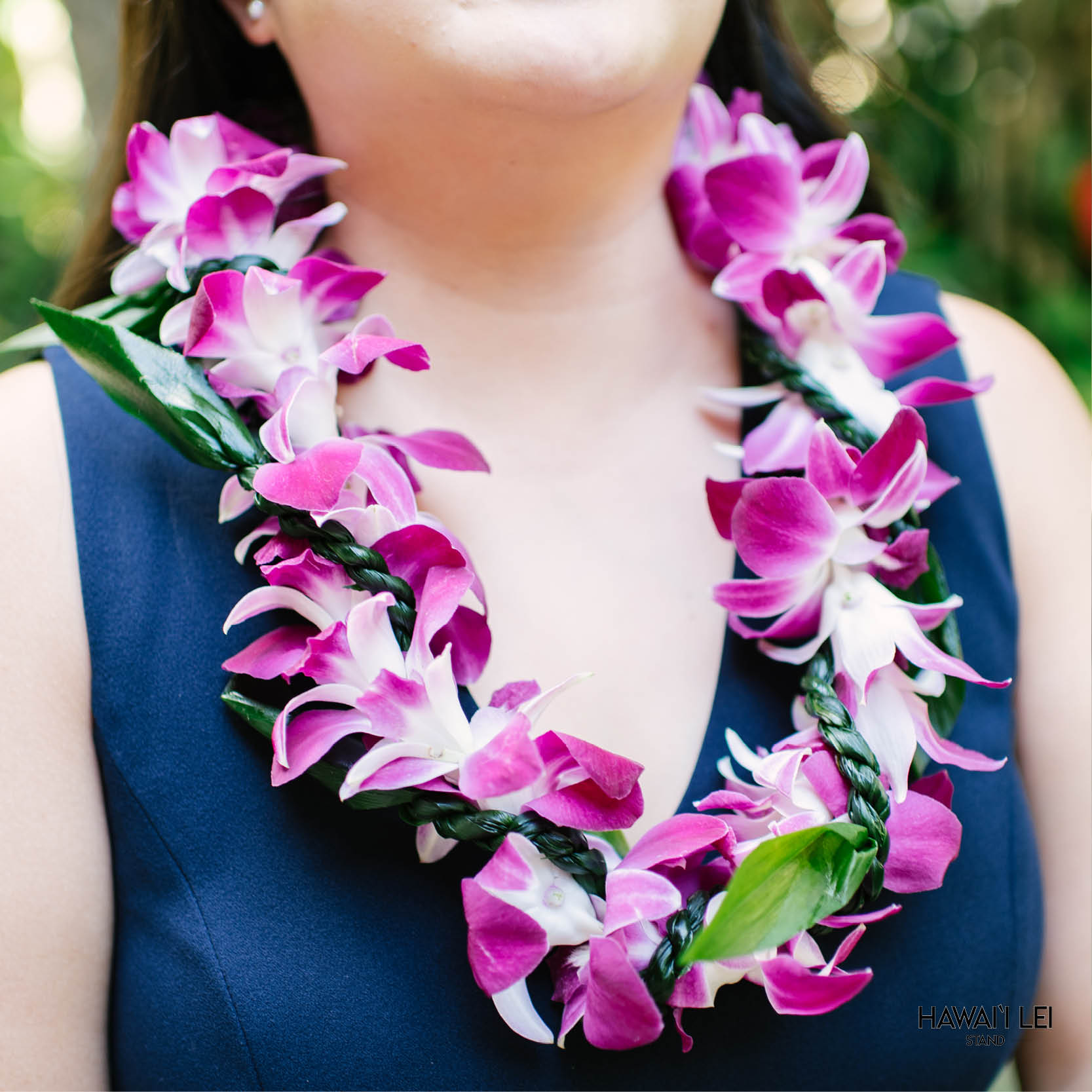 Orchid Wrapped With Ti Leaf Lei (Purple)