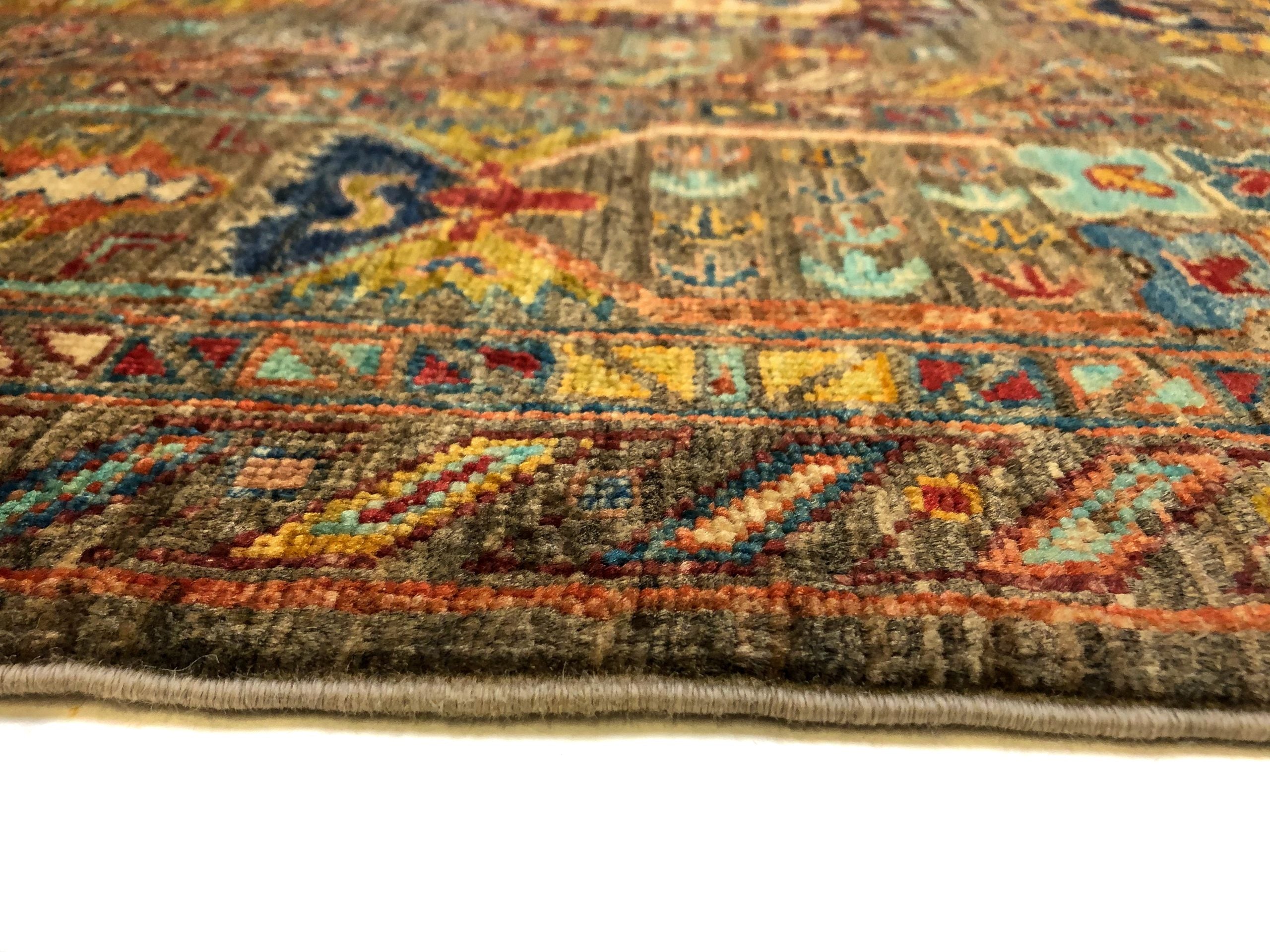 Khorjin (5'06"x7'08") camel/jewel tones