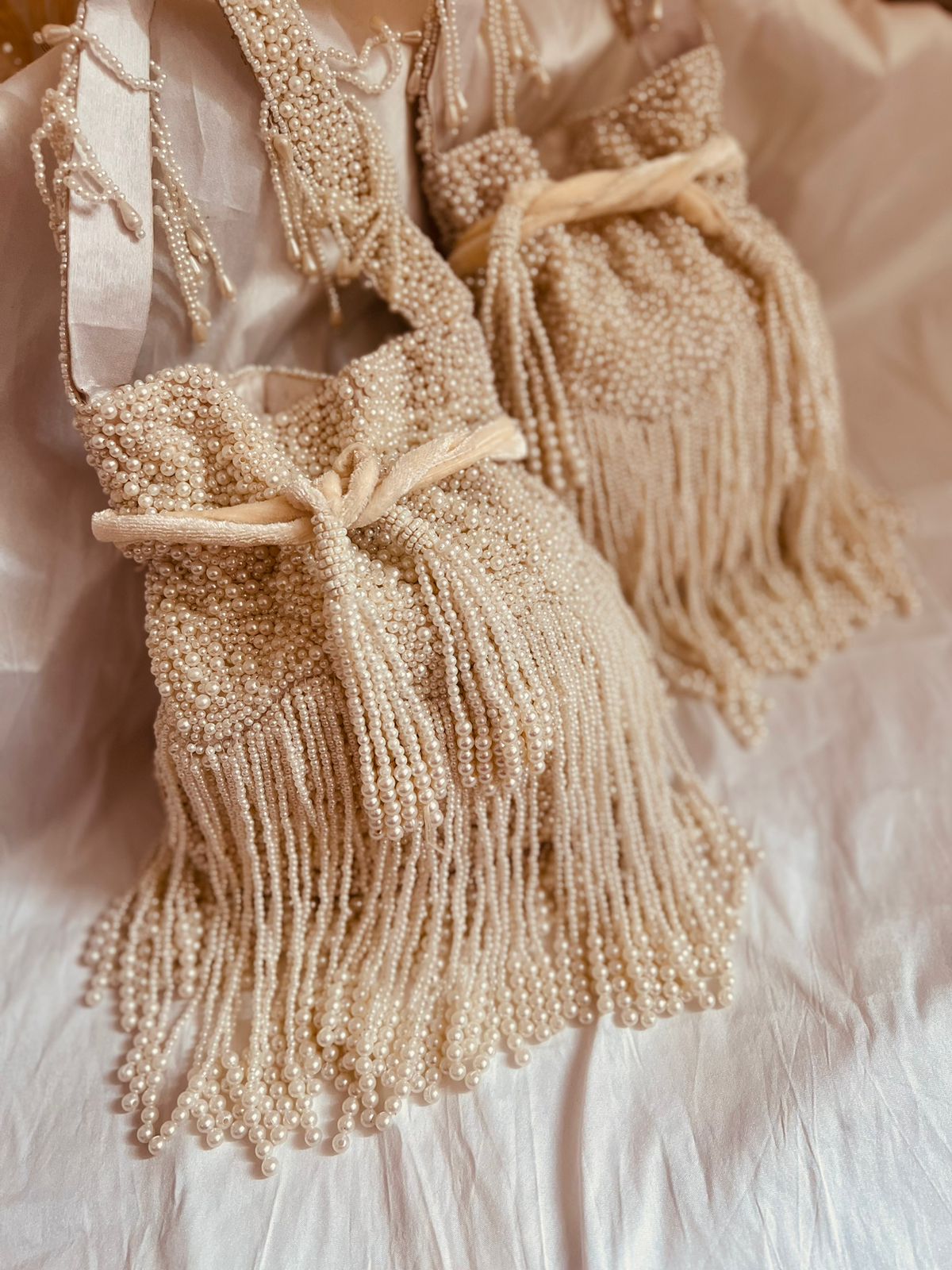 Faux Pearl Designer Potli Bags with Long Tassels