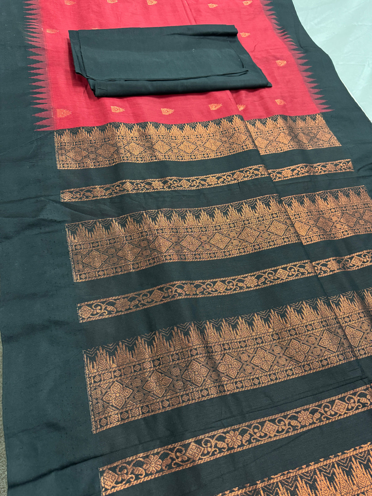 Dhriti: Dark Red Blended Cotton Gadwal Saree with Black Zari Border