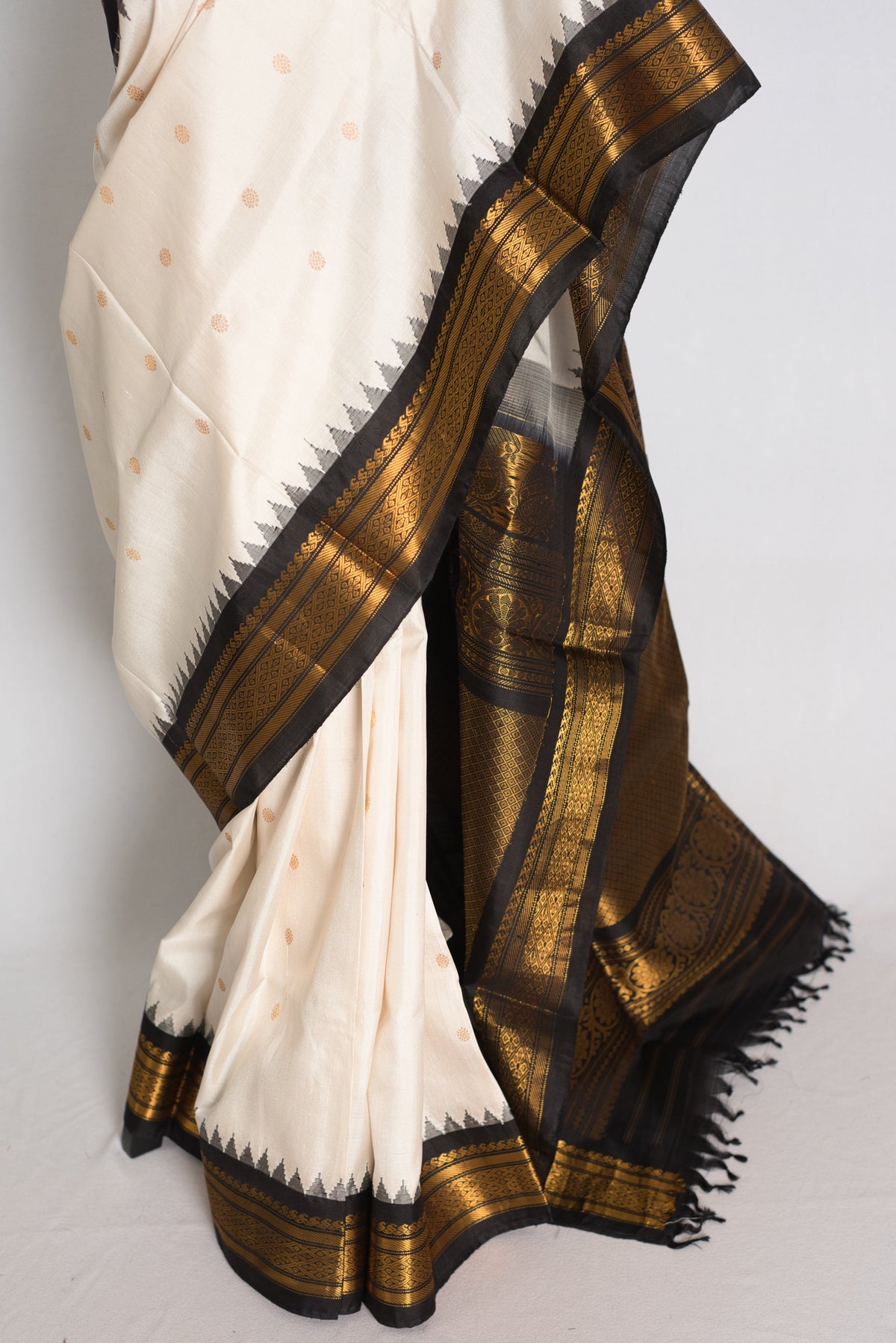 Sabina : Off White and Black Handwoven Gadwal Silk Saree with Gold Zari