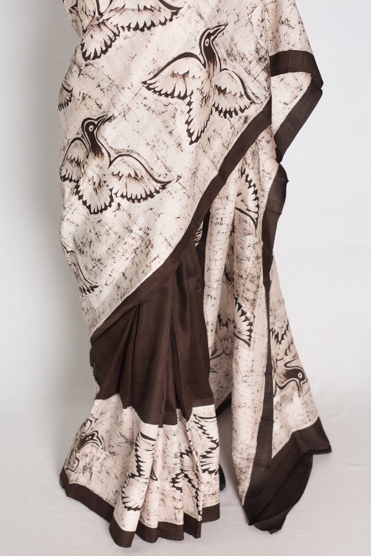 Bristi : Off-White and Coffee Brown Half and Half Hand Batik Pure Silk Saree
