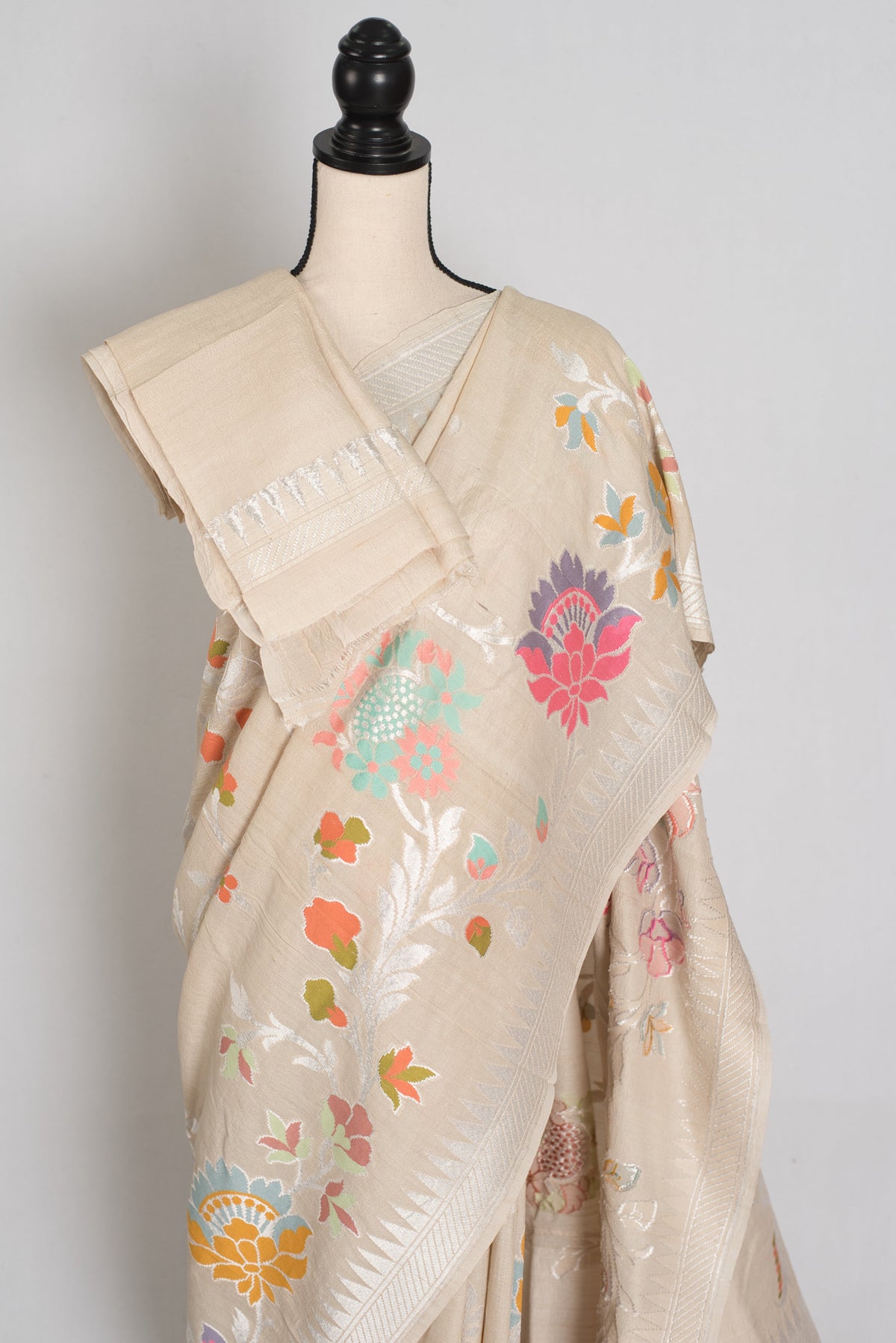 Nidhi : Beige & Silver Tussar Georgette Banarasi Saree with Minakari Florals