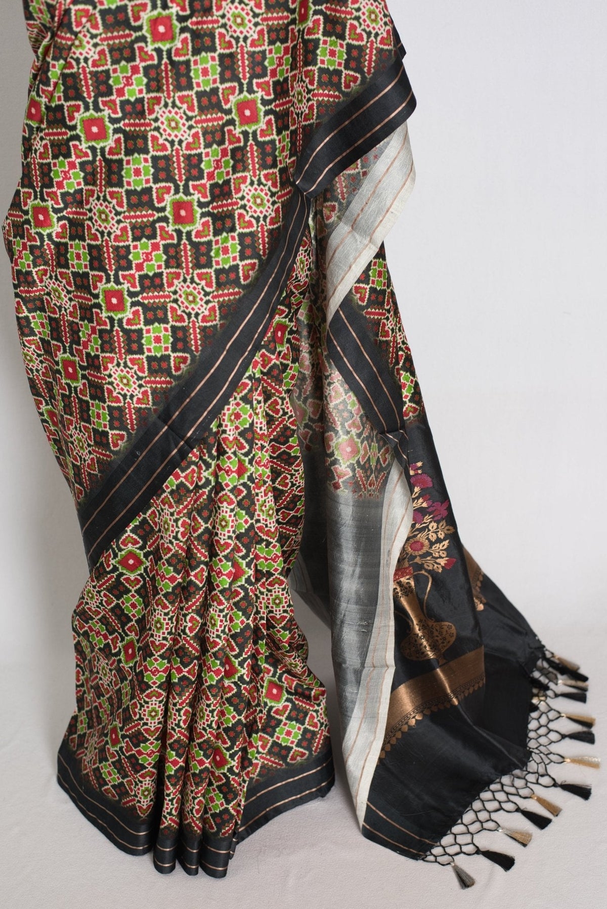 Kriti : Black and Gold Contemporary Ikkat Print Banarasi Katan Silk Saree
