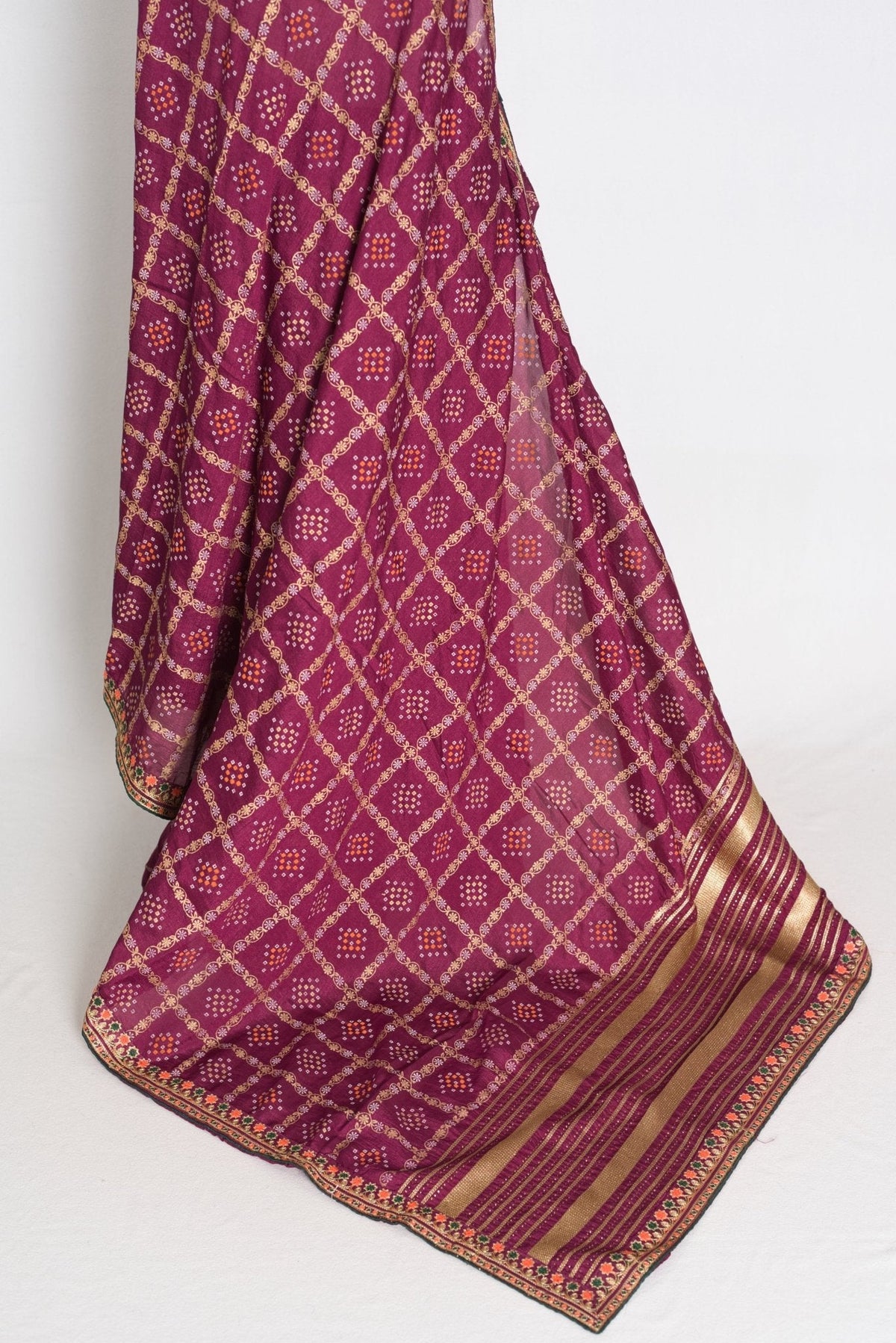 Suma : Purple Gharchola Gold Printed Saree with Embroidered Border