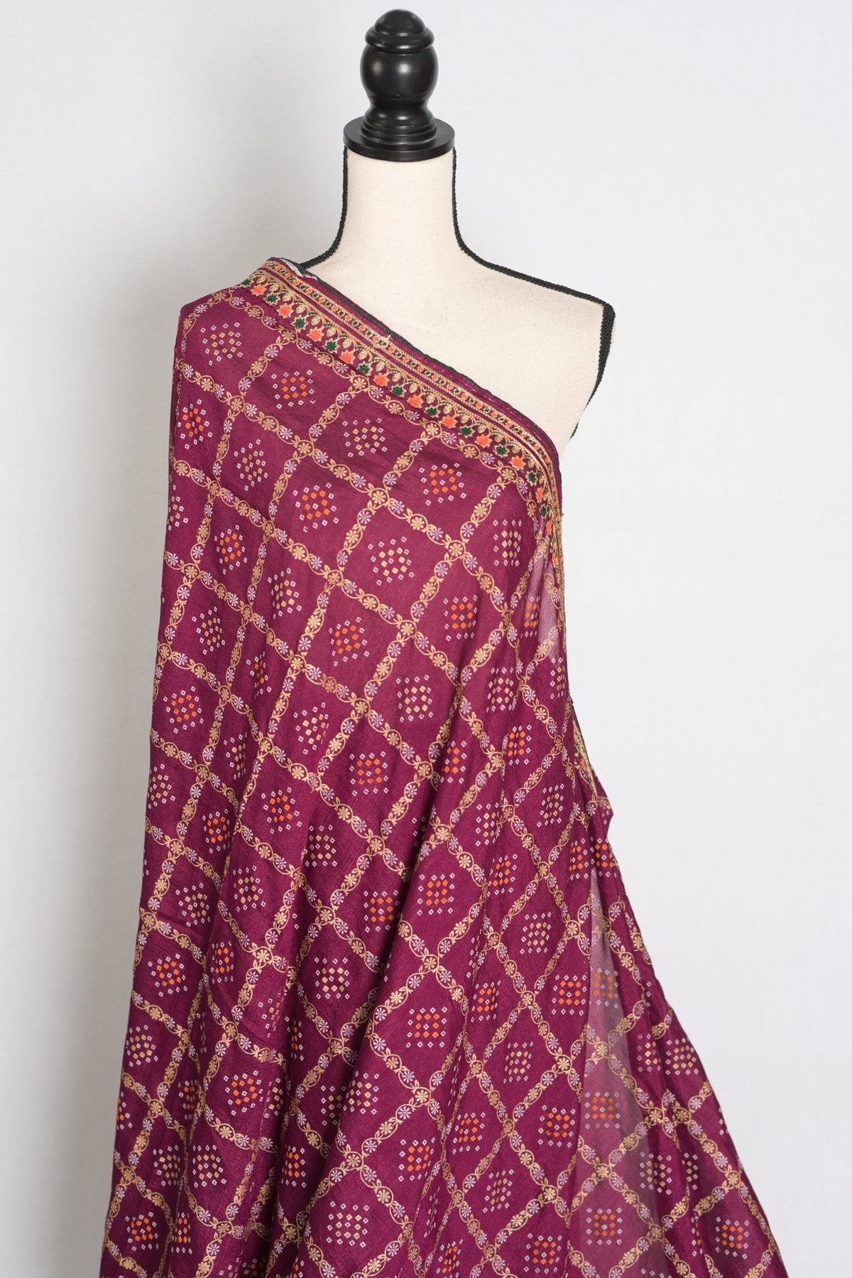 Suma : Purple Gharchola Gold Printed Saree with Embroidered Border