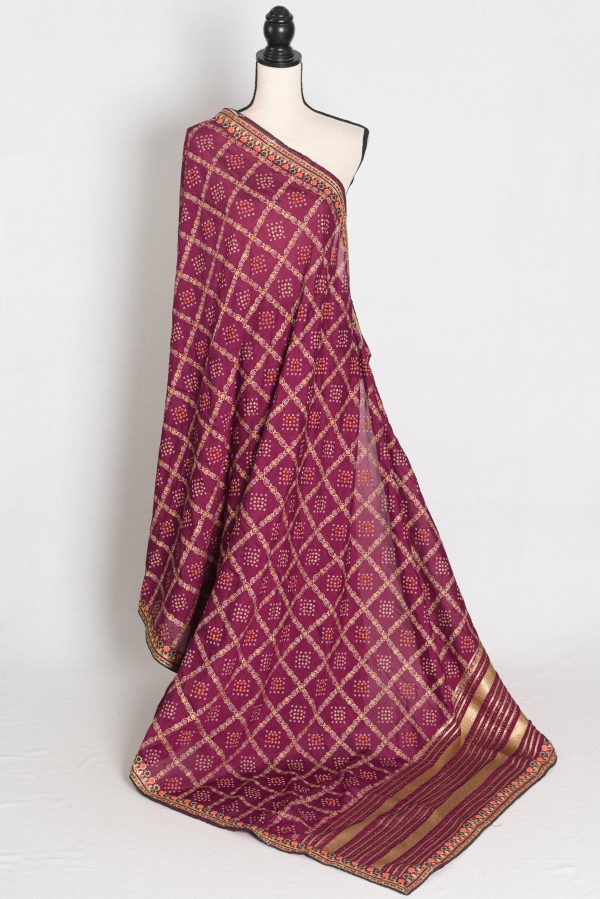 Suma : Purple Gharchola Gold Printed Saree with Embroidered Border