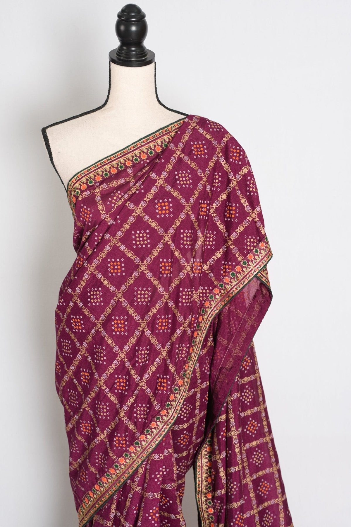 Suma : Purple Gharchola Gold Printed Saree with Embroidered Border